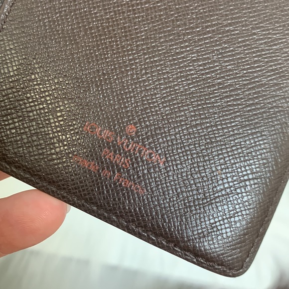 100% authentic Louis Vuitton Damier Ebene (DE) long vertical wallet organizer. - Picture 13 of 15